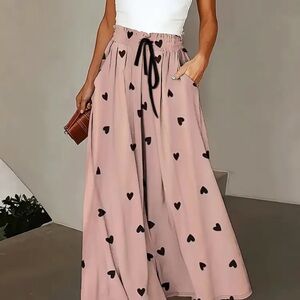 NWOT NEVER Worn LOVE these pants! Super cute and so comfortable.